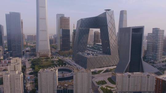 4K航拍北京CBD央视大楼晚霞城市高楼朝阳区视频素材模板下载