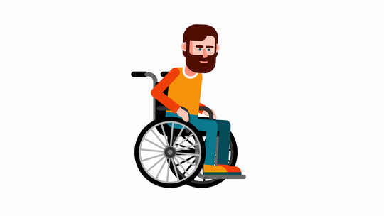 一个残疾人坐在轮椅上移动。