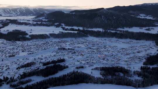 新疆阿勒泰地区禾木村雪景航拍