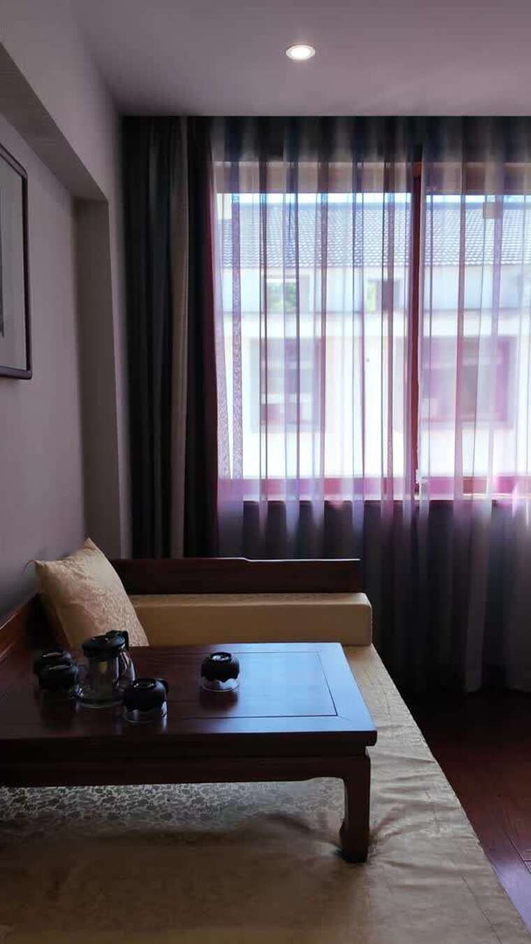 室内客厅沙发茶几及窗帘景观