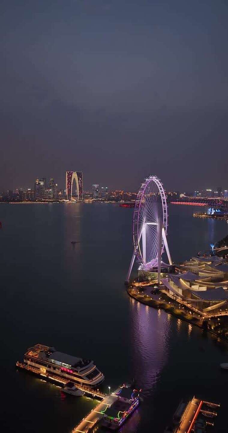 苏州金鸡湖畔苏州之眼摩天轮夜景航拍