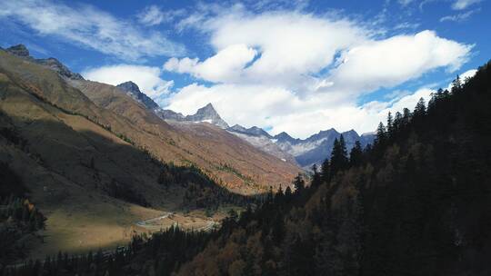 著名景区四姑娘山双桥沟航拍蓝天白云山林水