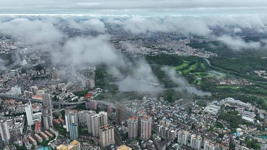 航拍云海中的广州越秀区城市建筑视频素材模板下载