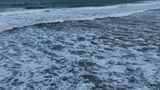 航拍泰国普吉岛海面波浪冲刷海滩景观高清在线视频素材下载