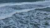 航拍泰国普吉岛海面波浪冲刷海滩景观高清在线视频素材下载