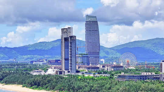 航拍蓝天白云的海南三亚市海棠湾海景酒店