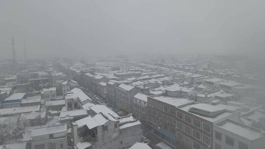 农村城镇下雪4K航拍原素材