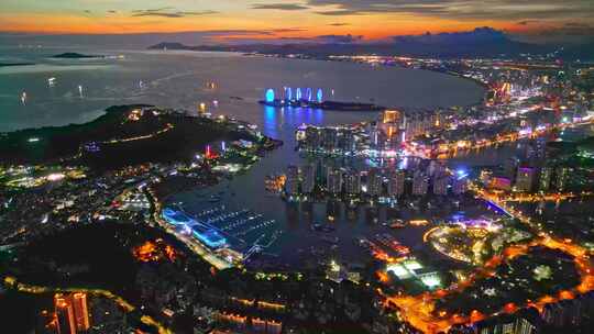 海南三亚三亚湾日落自贸港城市夜景唯美