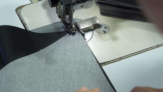 缝纫机缝纫服装画面