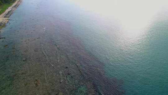 航拍海南三亚西岛海洋文化旅游区海浪礁石