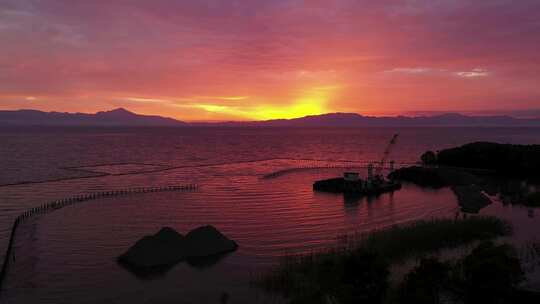 小岛粉色朝阳夕阳剪影