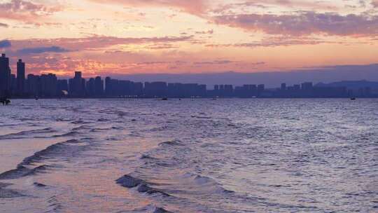 烟台海滩日落晚霞风景慢镜头