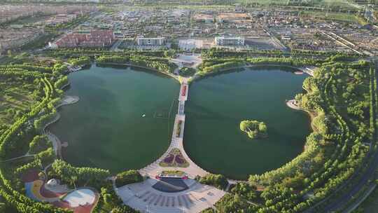 新疆伊犁巩留县蝶湖景区航拍城市风光