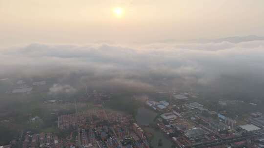 城市上空云海日出俯瞰景象