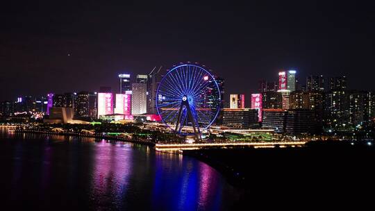 深圳宝安欢乐港湾摩天轮夜景海面前冲