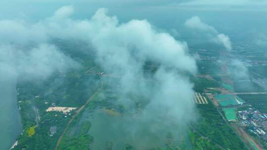 城市上空云海航拍全景石家庄雨后滹沱河云海