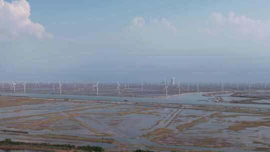 大海海边沙滩风车自然风光蓝天白云航拍