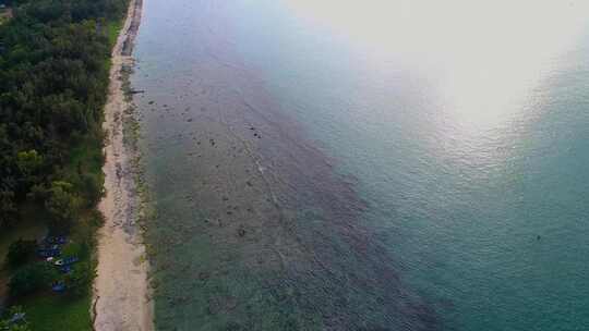 航拍海南三亚西岛海洋文化旅游区海浪礁石