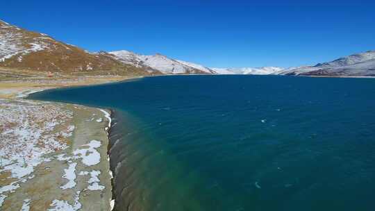 航拍西藏冬季羊卓雍措羊湖纳木错湖水与雪山