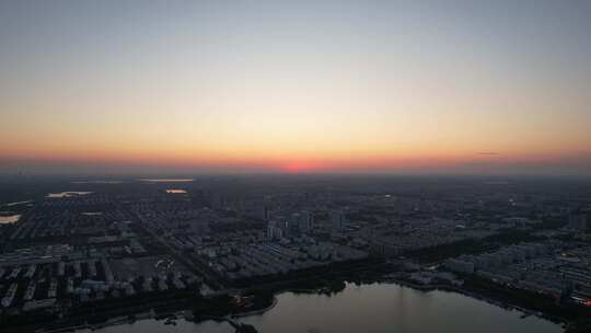 城市夕阳晚霞日落航拍东营日落