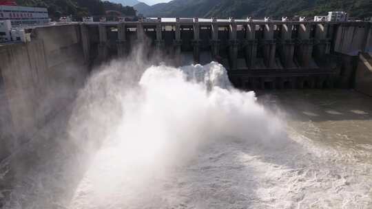 航拍水电站水库泄洪水力发电大坝开闸放水