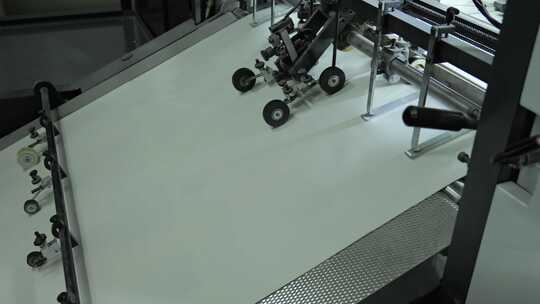 印刷厂里纸张运输裁剪流水线设备3视频素材模板下载