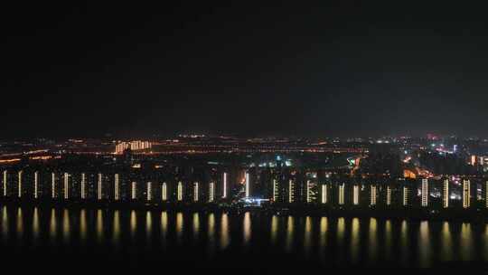 江滨小区夜景风光湖边社区居民楼建筑夜景