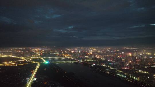 城市航拍洛阳阴雨天后城市云海夜景建筑