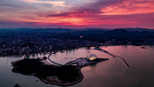 珠海地标大剧院日月贝晚霞航拍视频素材模板下载