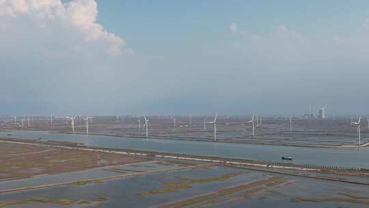 大海海边沙滩风力发电风车航拍视频素材模板下载
