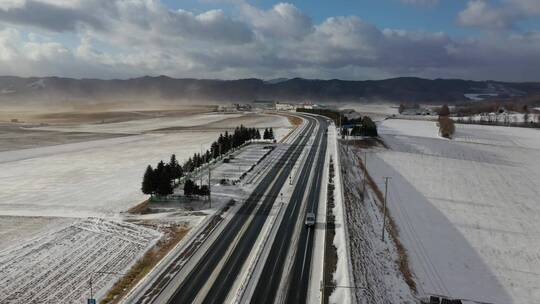 日本北海道端野乡村田野冬天雪原公路