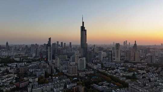 江苏南京CBD紫峰大厦建筑群日落夜景航拍