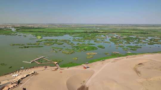 航拍宁夏石嘴山沙湖旅游景区沙漠湿地风光