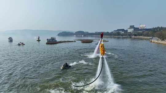 水上飞人舞狮表演航拍素材视频素材模板下载