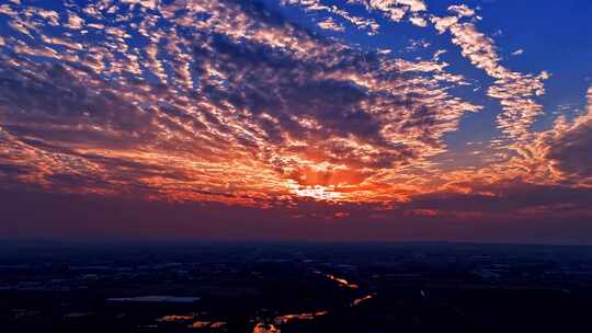 航拍延时摄影美丽的夕阳旁晚日落晚霞