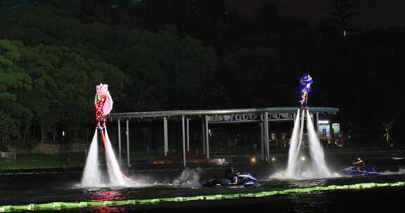 唯美城市夜晚水上飞人舞狮表演传统喜庆隆重