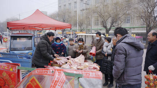 4k新春时节北方集市食品销售实拍视频视频素材模板下载