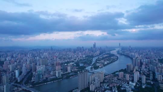 广州珠江岸城市建筑群夕阳晚霞航拍全景