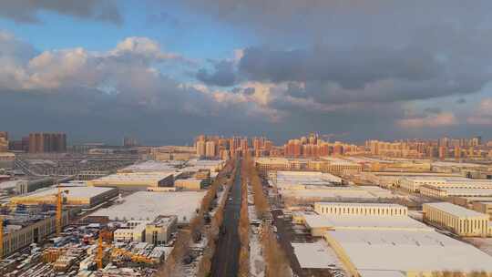 冬季航拍烟台大雪后的城市建筑和晚霞风景