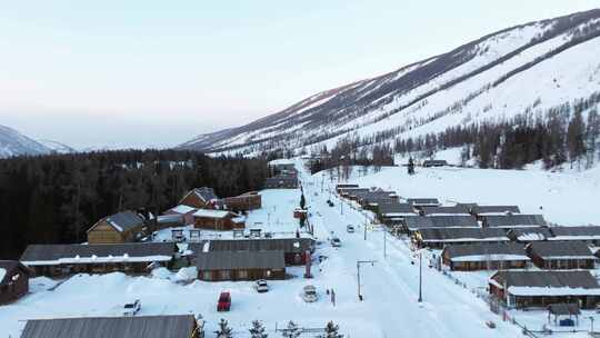 航拍新疆冬季喀纳斯湖雪景雪山森林冰河寒冷