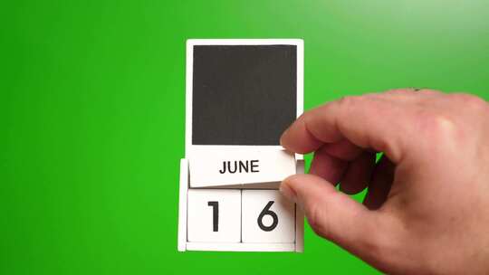 06.绿色背景上日期为6月16日的日历。视频素材模板下载