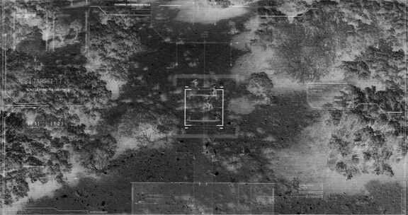 军用无人机在野外空中监视一群士兵