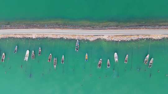 航拍海洋港湾渔船成排城市渔业码头船舶休渔