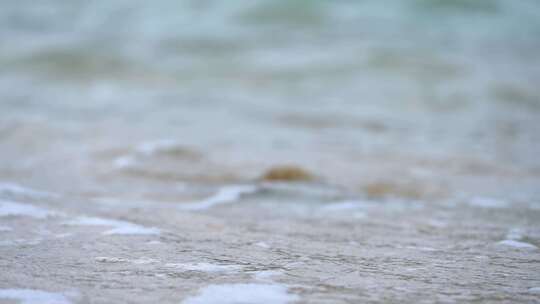 海南三亚海边沙滩海浪特写