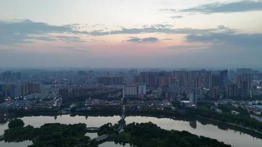 夕阳下的眉山城市风光航拍