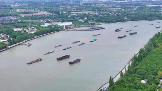 航拍上海黄浦江上游船舶货物运输水路运输