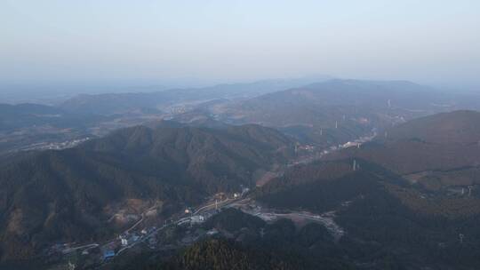 航拍绿色森林蜿蜒盘山公路