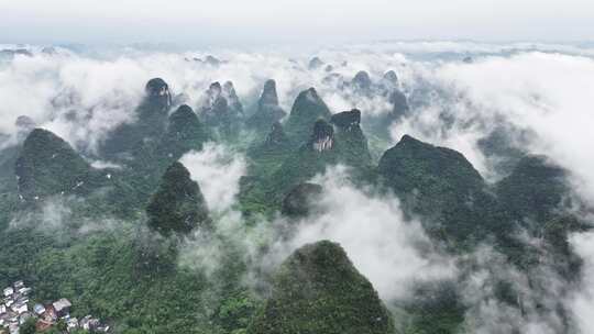 航拍桂林云海下的山峰