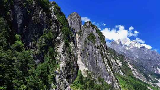 航拍四川甘孜磨西镇燕子沟爱德嘉峰雪山风光