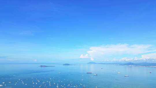 海南三亚三亚湾蓝色海洋天空空镜头航拍风景